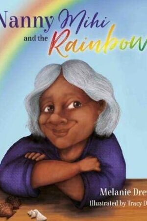 An old woman sitting and smiling with shells in front of her